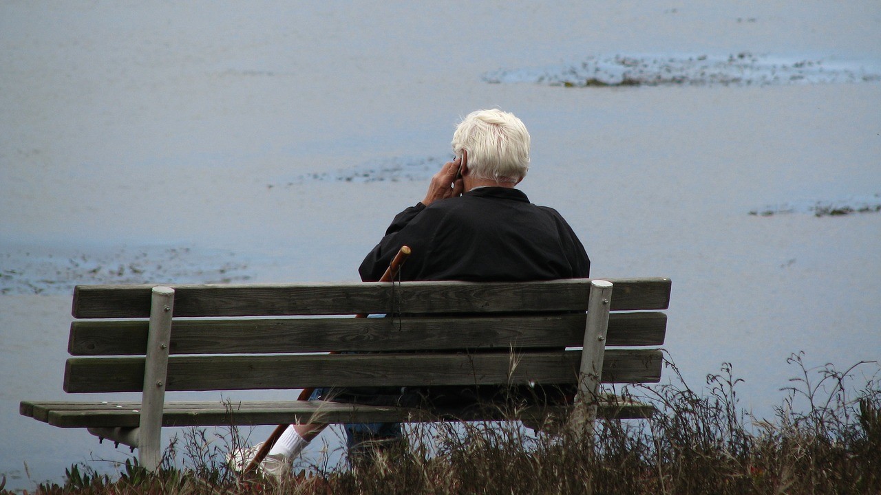Old man talking on phone