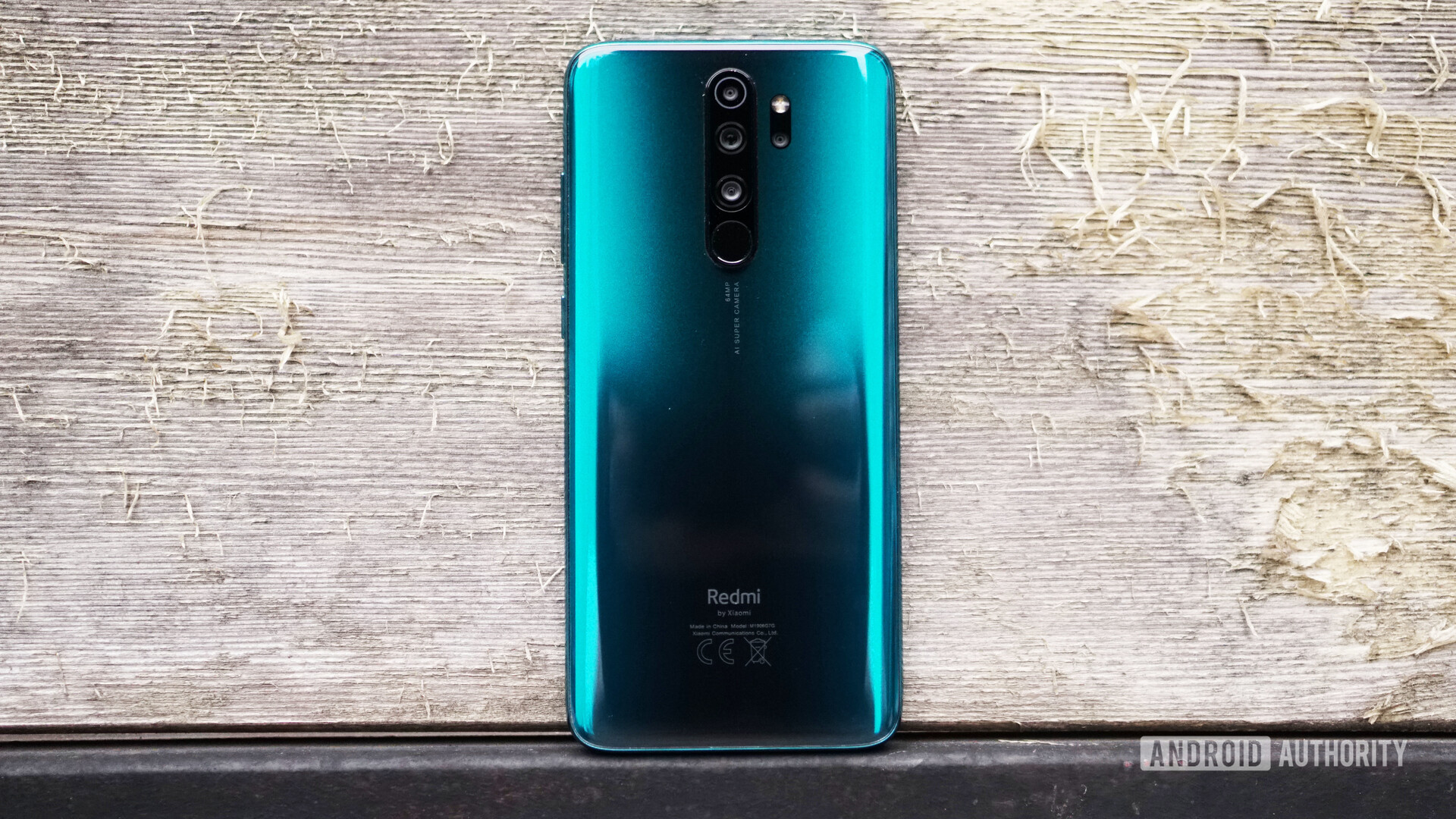 Redmi Note 8 Pro review back glass against wood