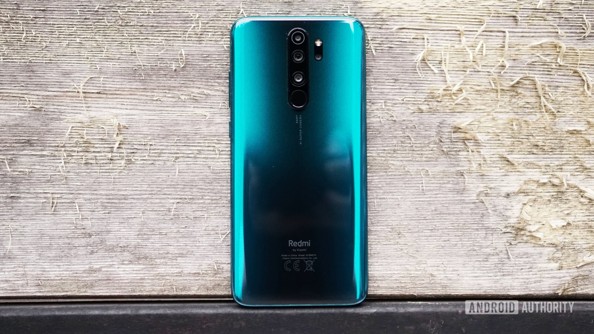 Redmi Note 8 Pro review back glass against wood