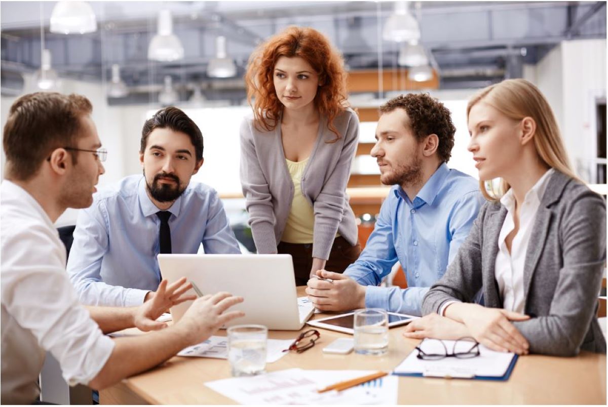 five colleagues in a business meeting inbox