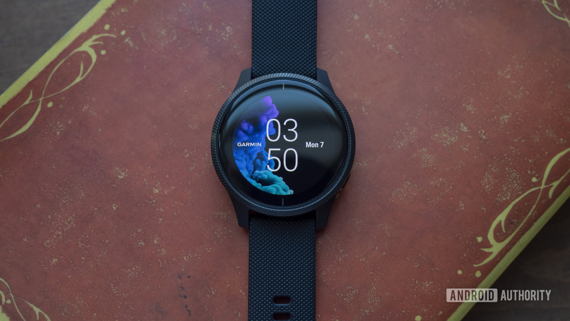 garmin venu review watch face case on table 8