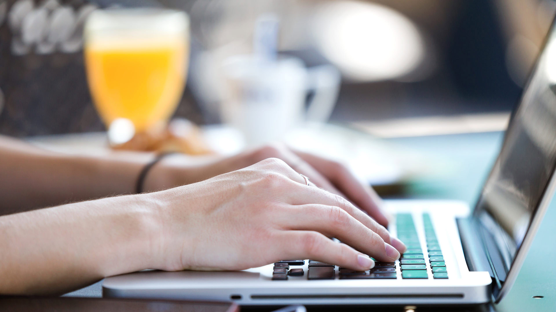 young woman working with at laptop while loading