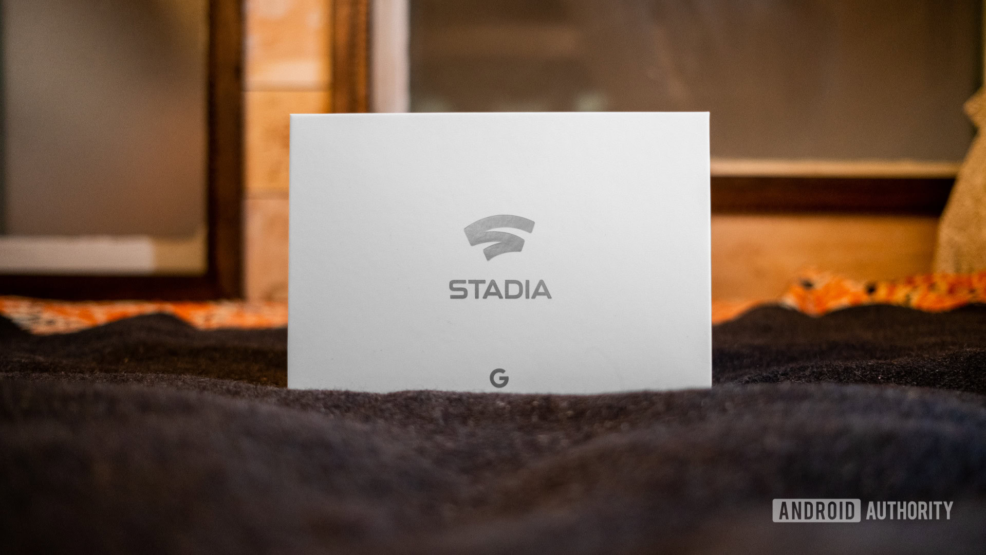 Google Stadia Founders Edition box on carpet straight ahead 2