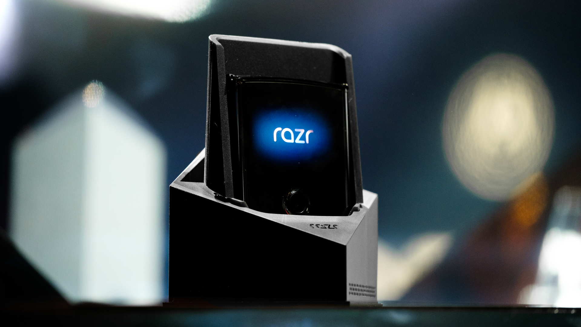 Moto Razr foldable folded sitting in box speaker