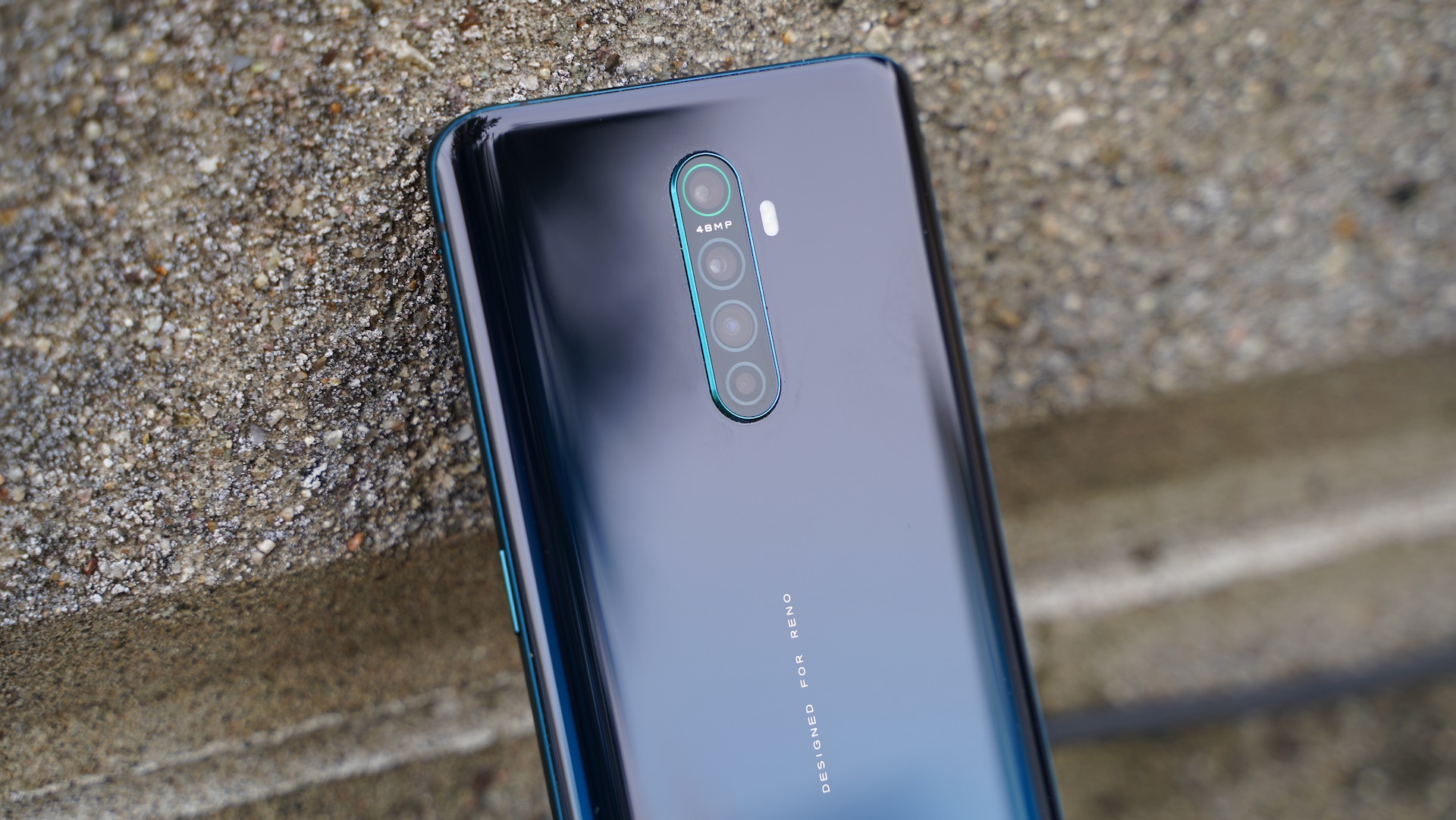 Oppo Reno Ace review against brick