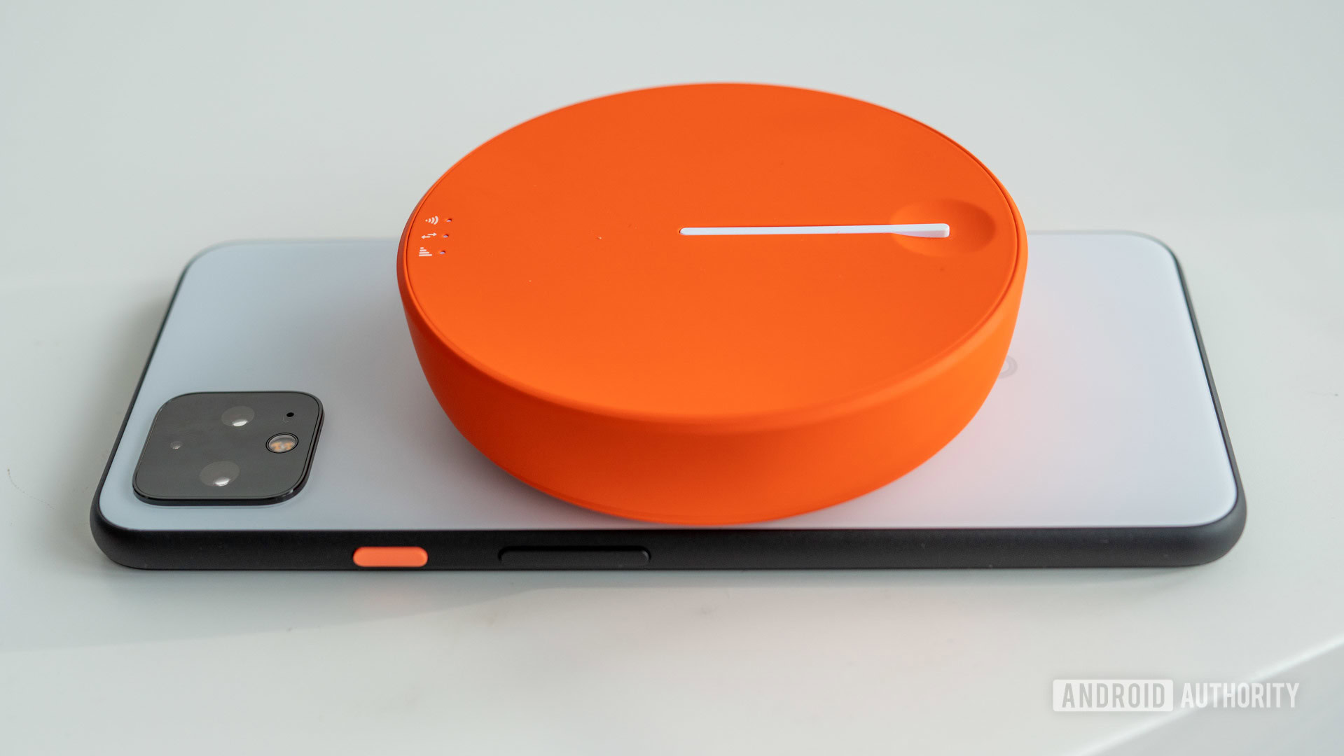 Skyroam Solis X on top of smartphone in landscape