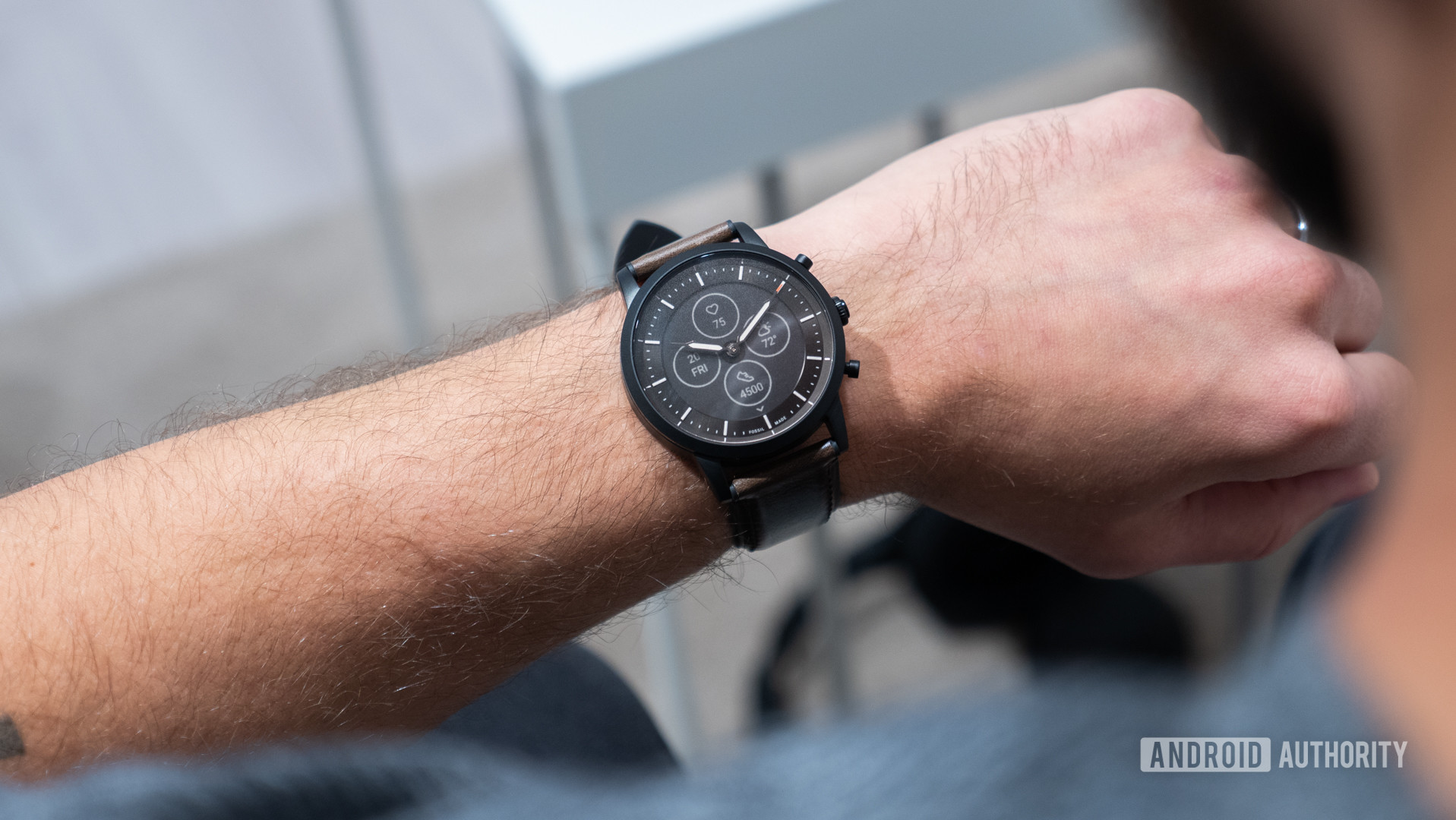 fossil hybrid hr charter hr smartwatch on wrist 1