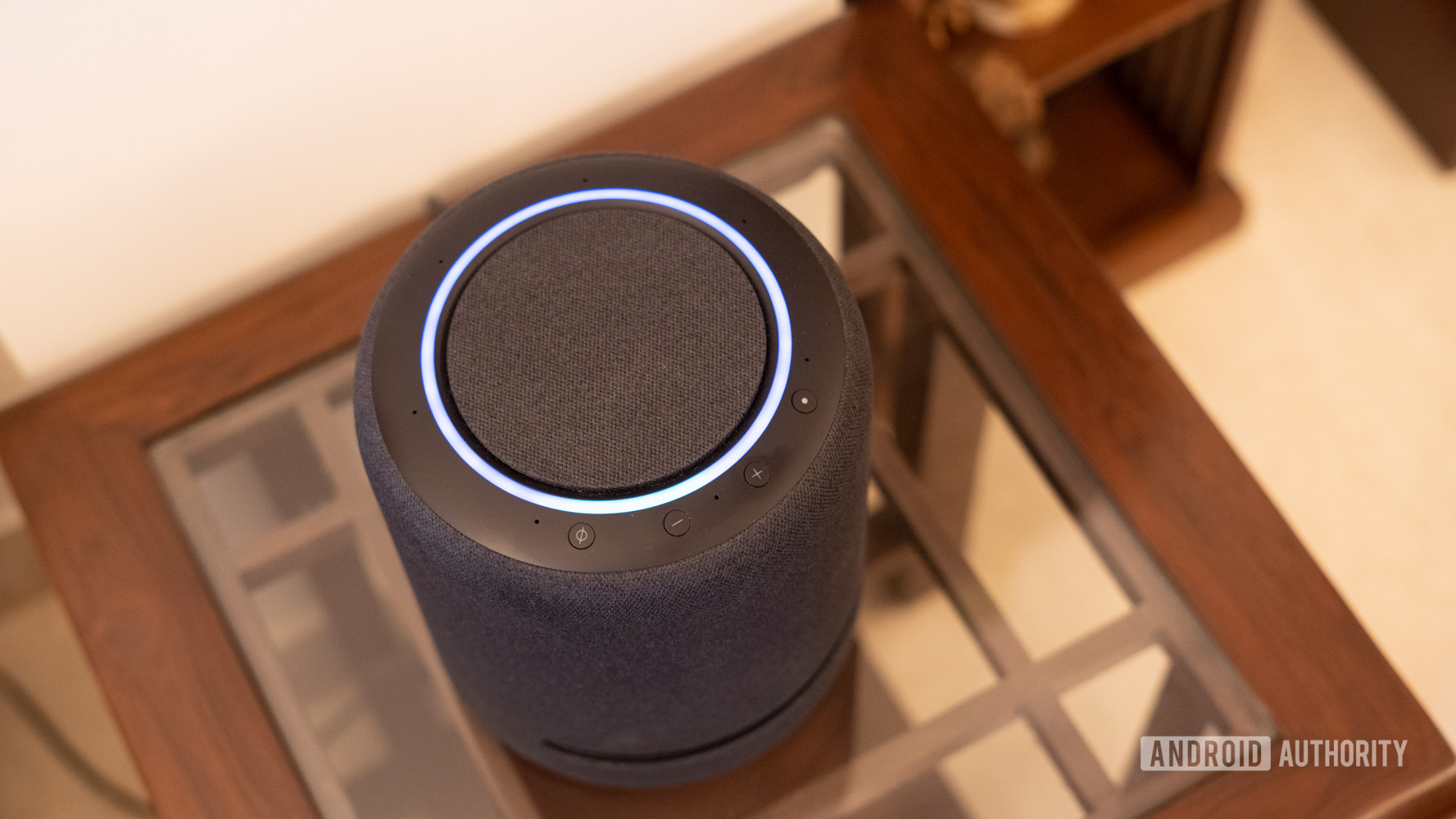Echo Studio with blue colored ring and control buttons