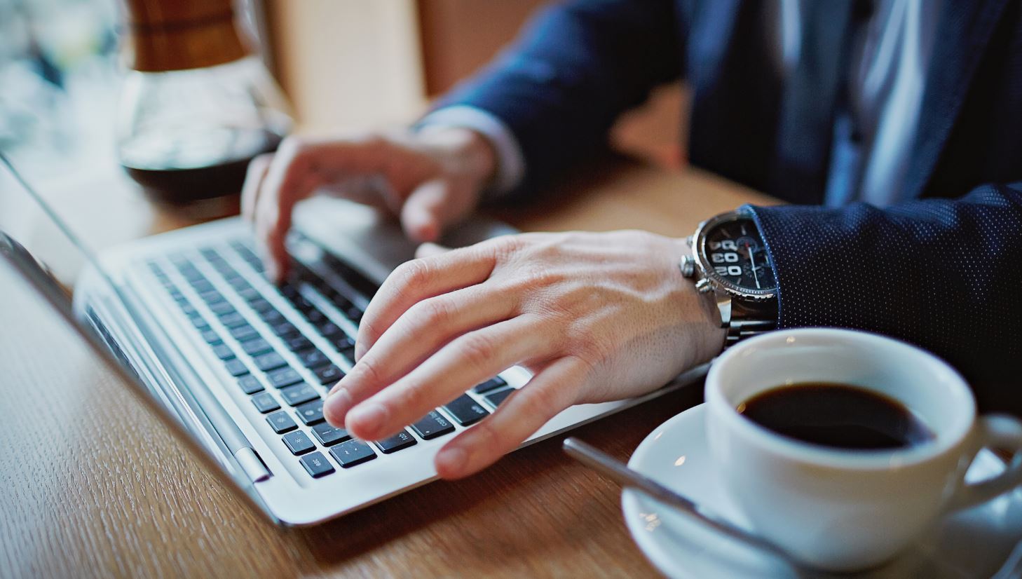 Hands Typing Coding Laptop