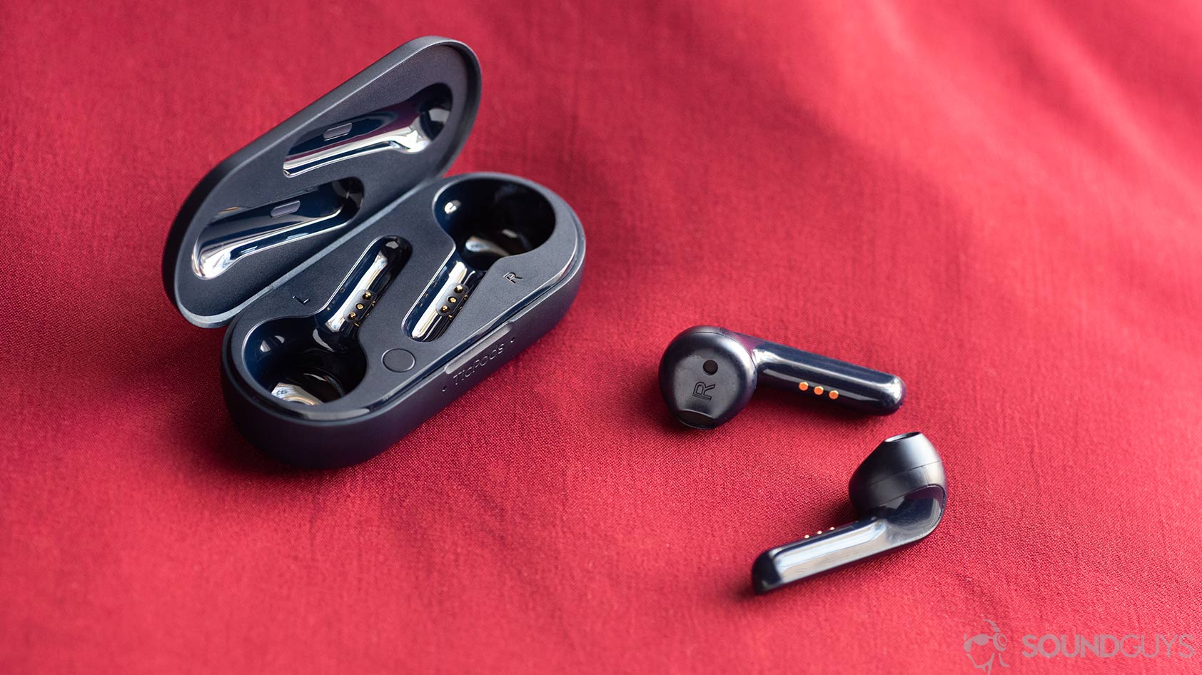 A picture of the Mobvoi TicPods 2 Pro true wireless earbuds outside of the charging case.