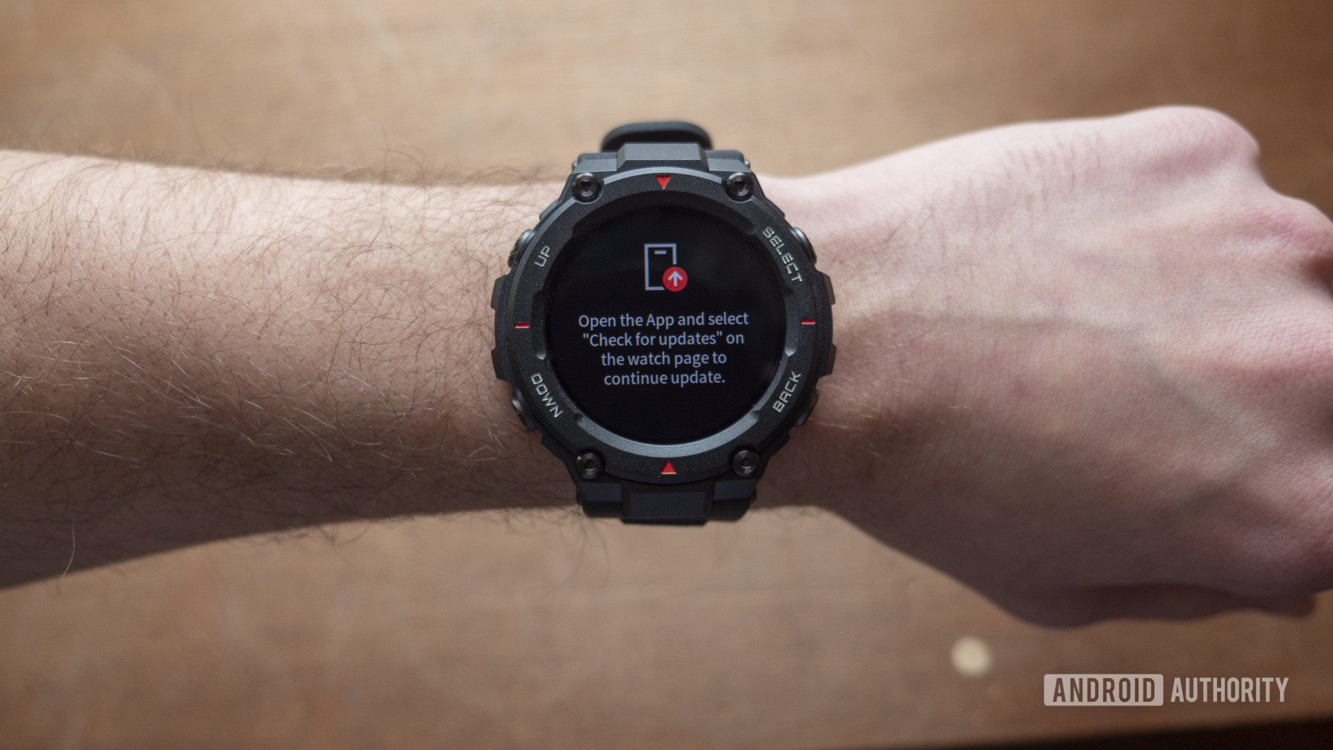 huami amazfit t rex smartwatch open the app and select check for updates display message on wrist