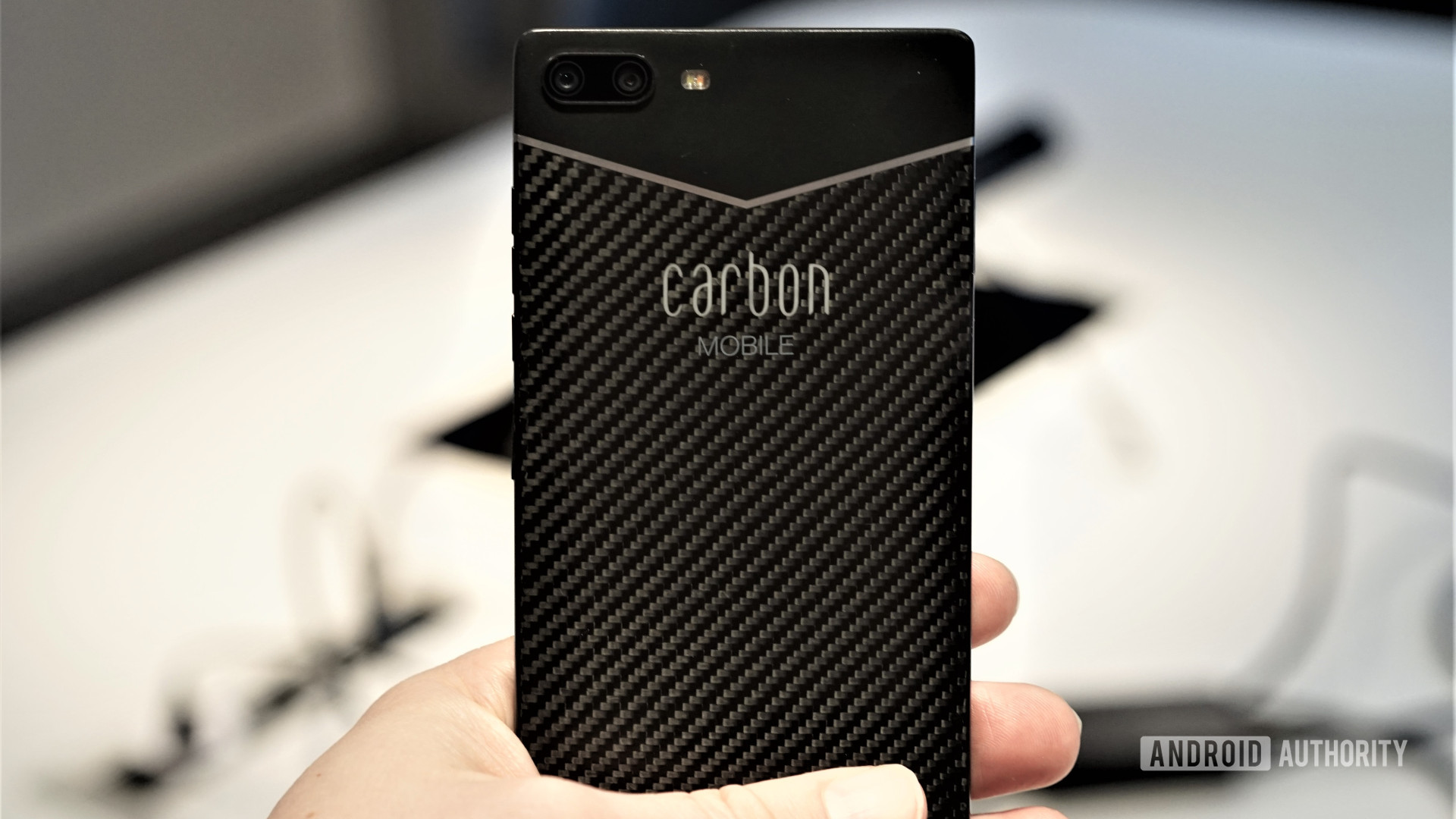 Carbon Mobile Mk II in hand