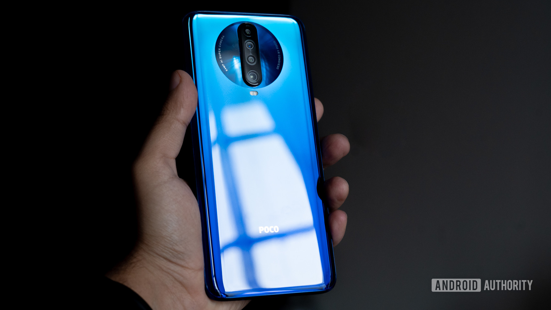 Poco X2 in hand showing back