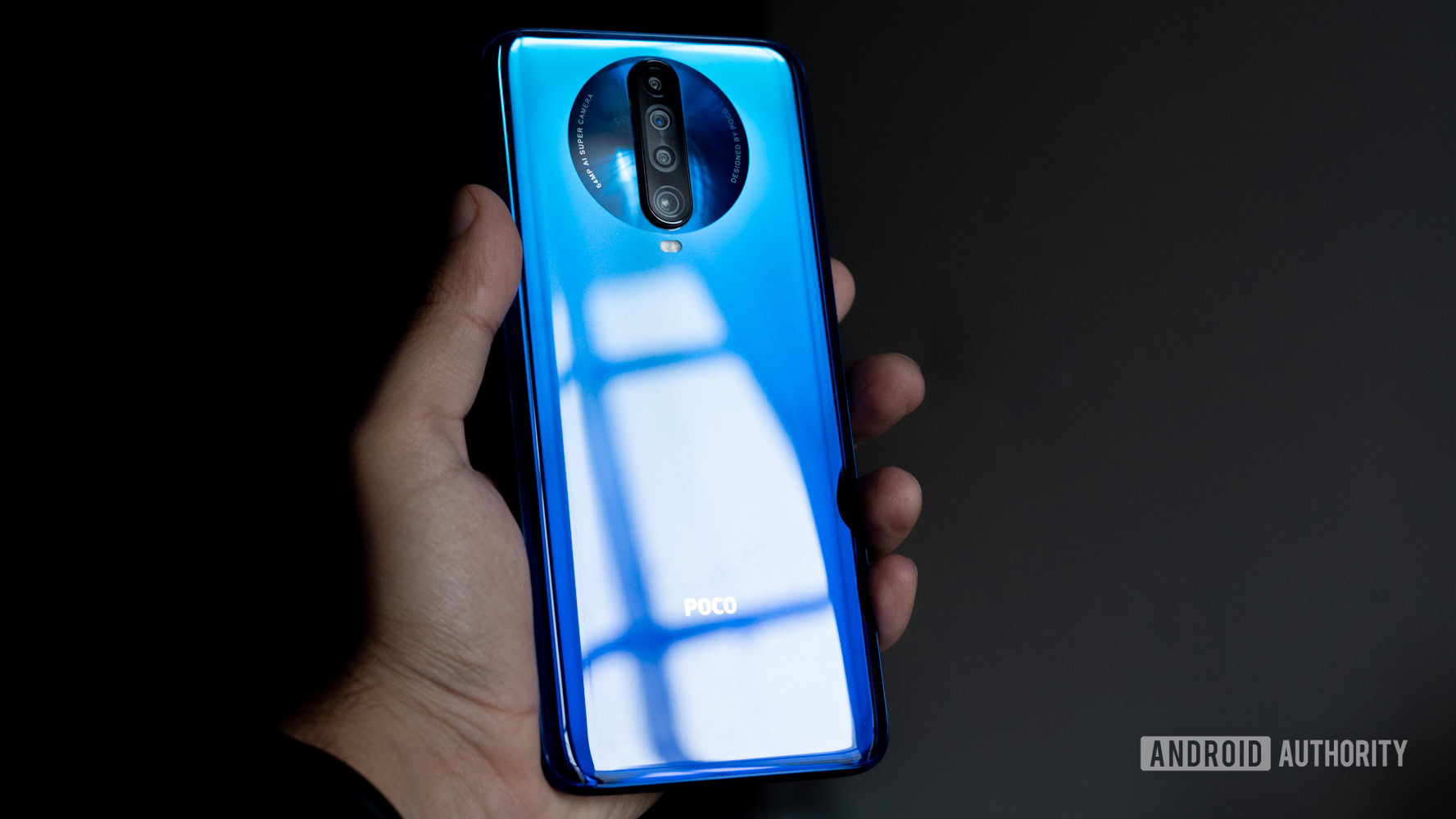 POCO X2 in hand showing back