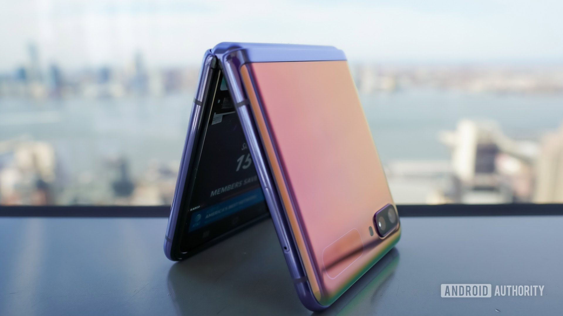 Samsung Galaxy Z Flip standing with city