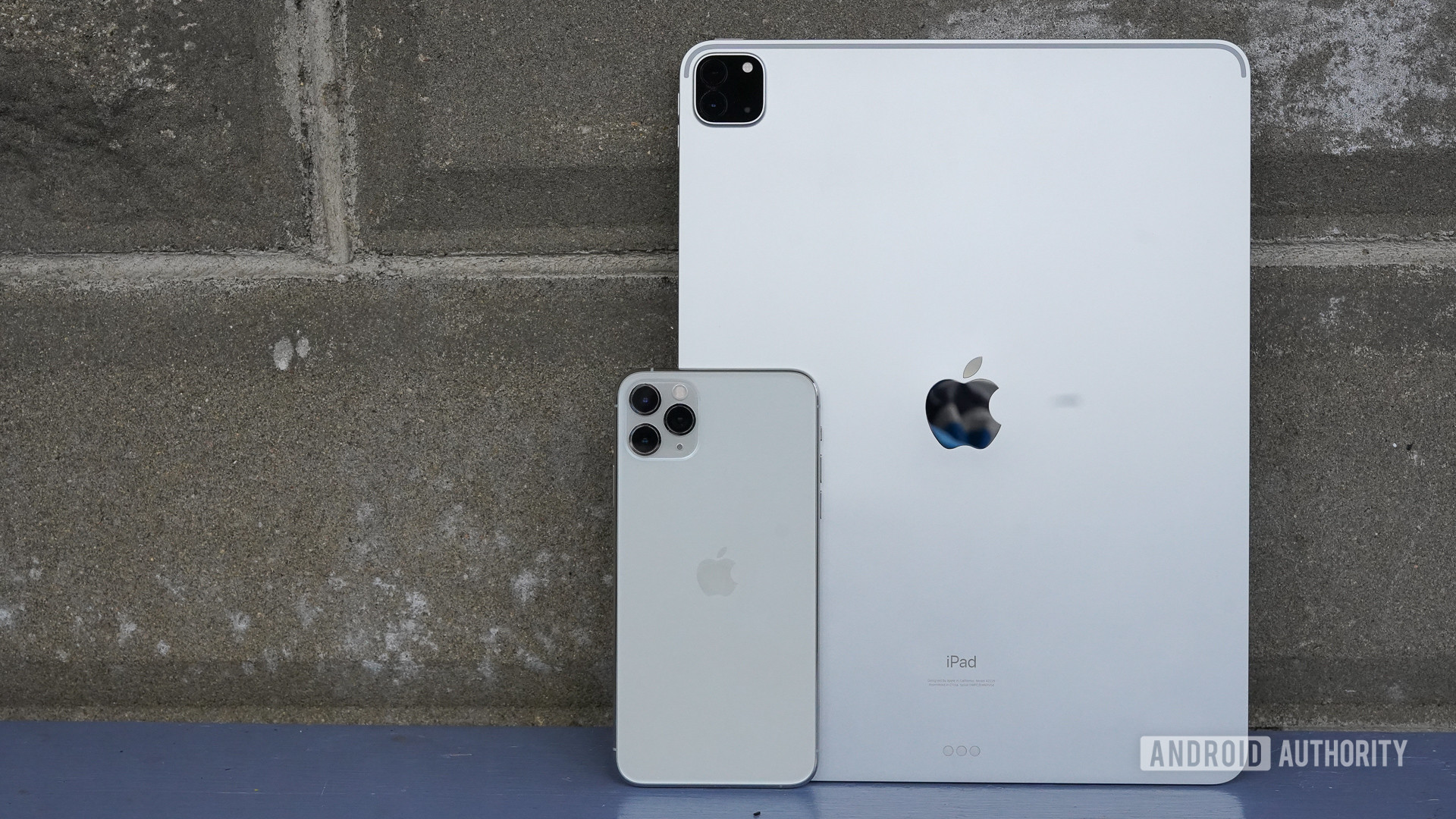 Apple iPad Pro 2020 standing with iPhone