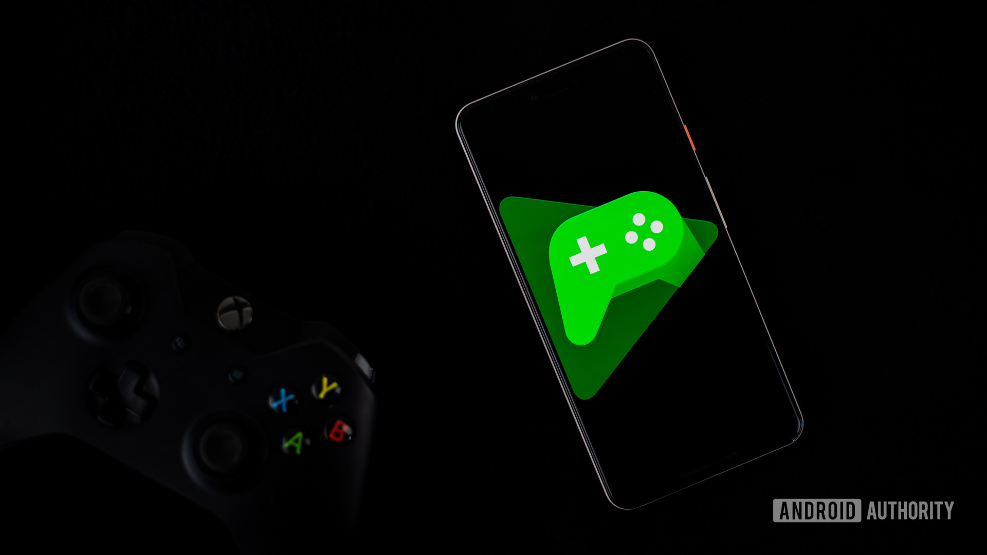 Google Play Games on smartphone next to controller3