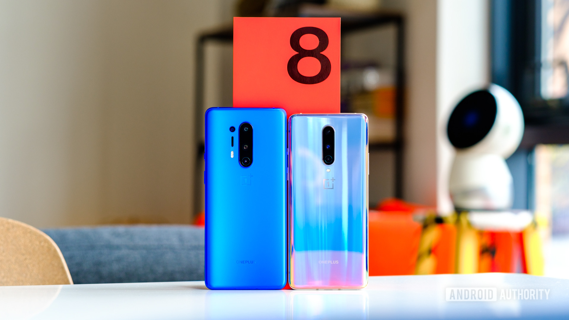 OnePlus 8 and 8 Pro in front of box