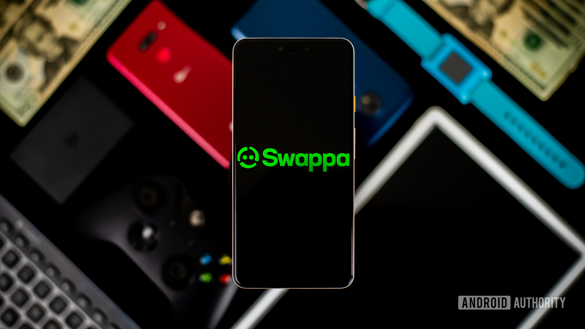 Swappa logo on smartphone with devices on background stock