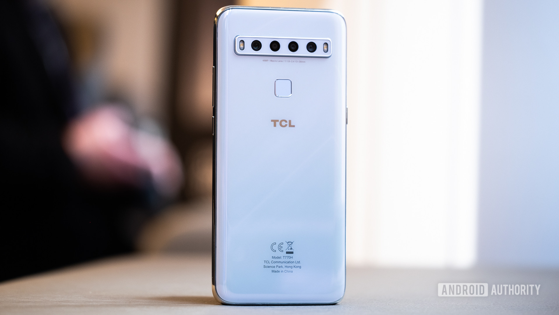 TCL 10L back of phone standing up