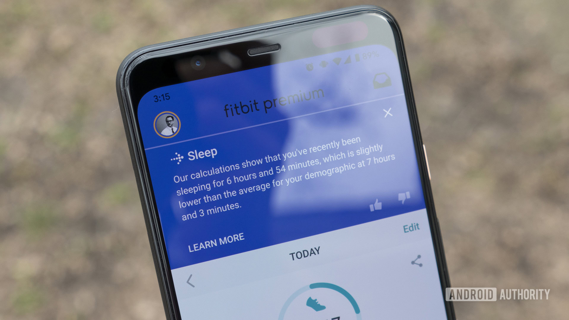 A smartphone displays a Fitbit Premium user's personalized sleep insights.