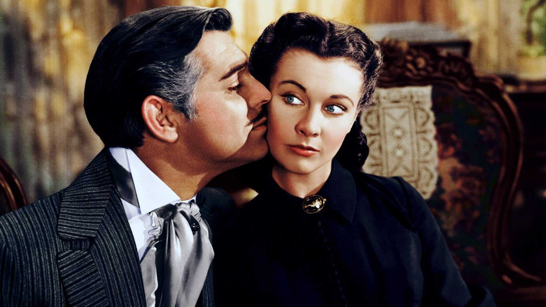 Clark Gable kisses Vivien Leigh's cheek in gone with the wind