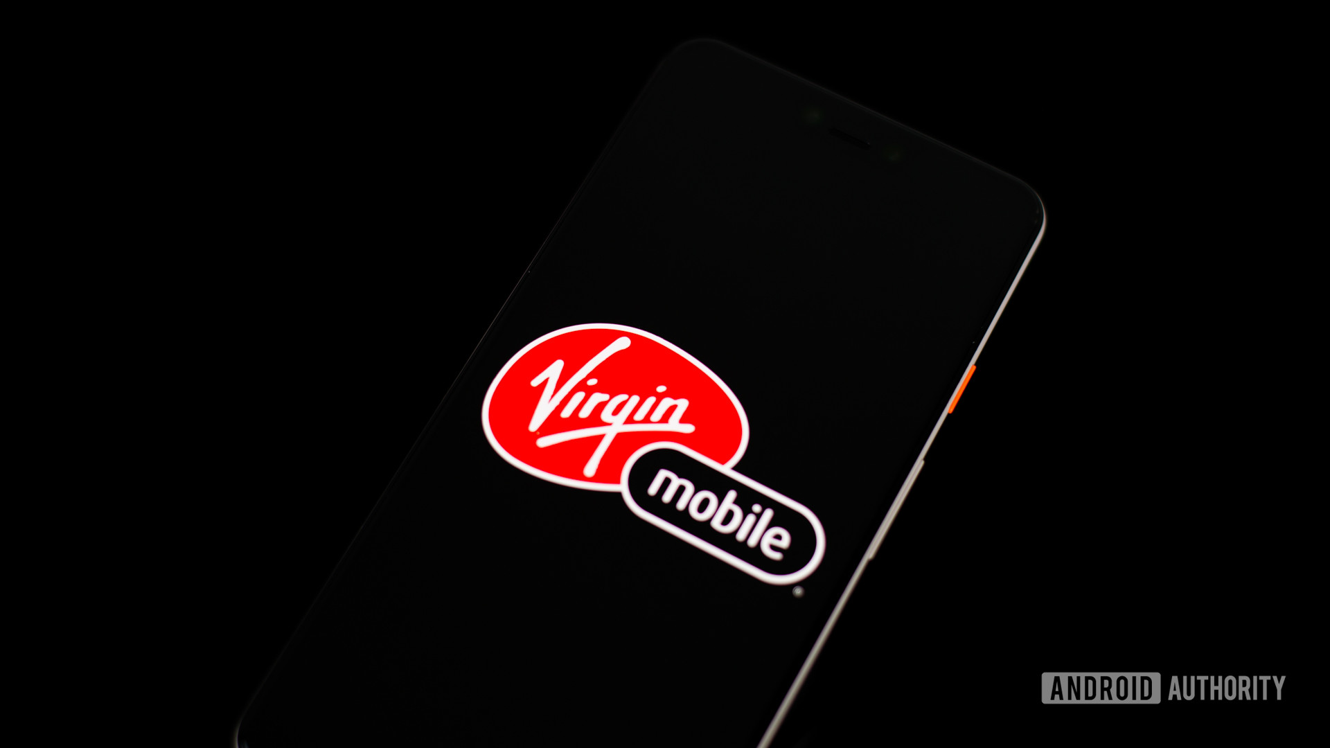 Virgin Mobile MVNO carrier logo on phone stock photo 2
