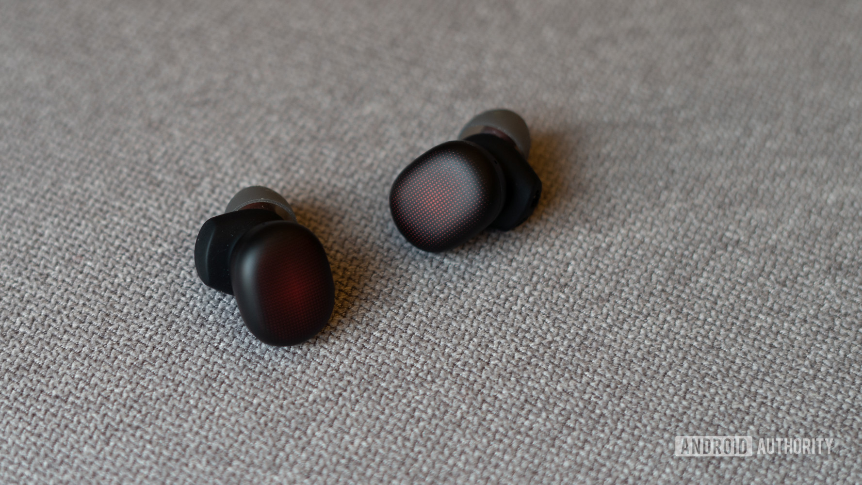 Amazfit Powerbuds Review earbuds showing texture