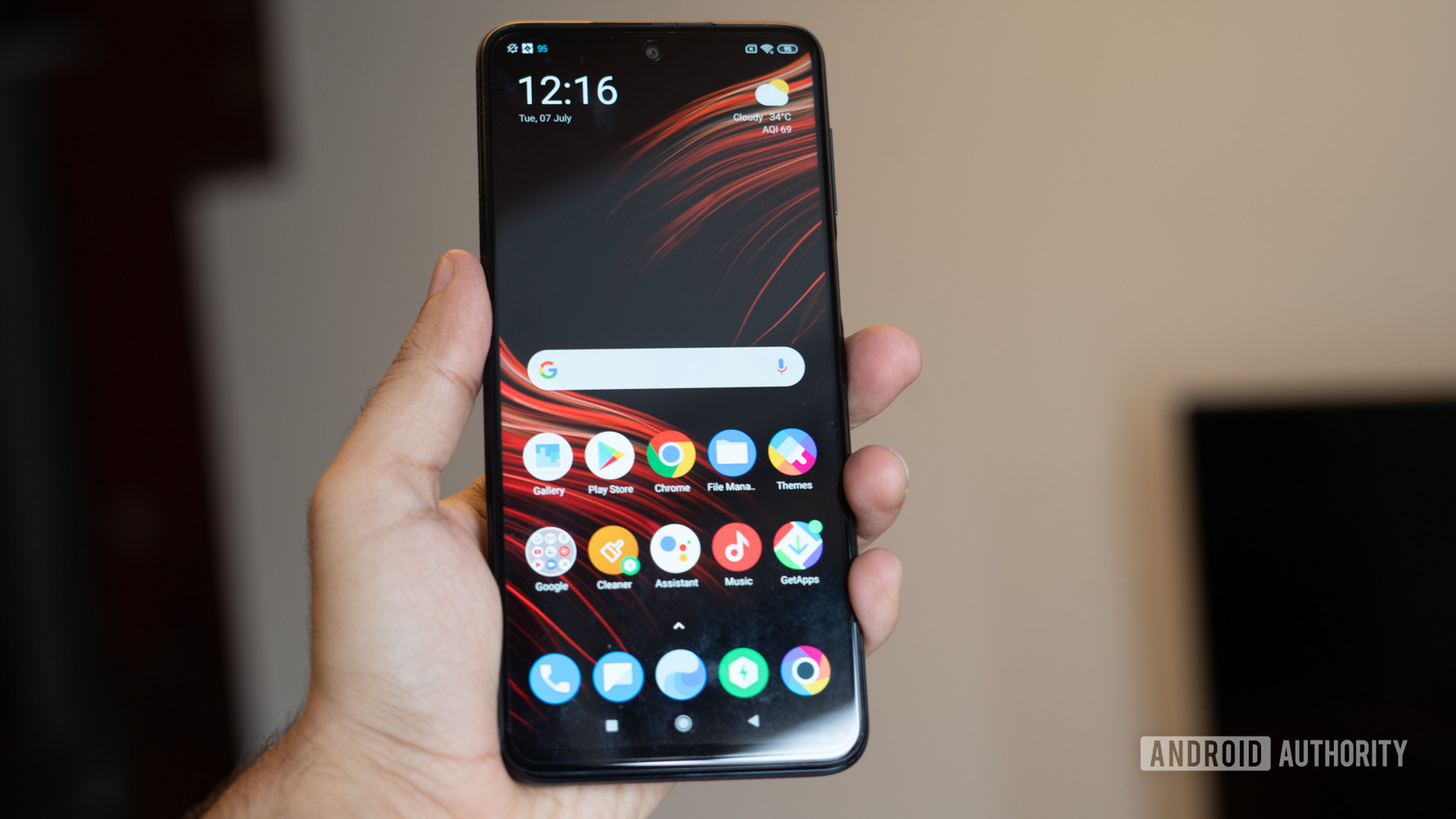 Poco M2 Pro showing display in hand