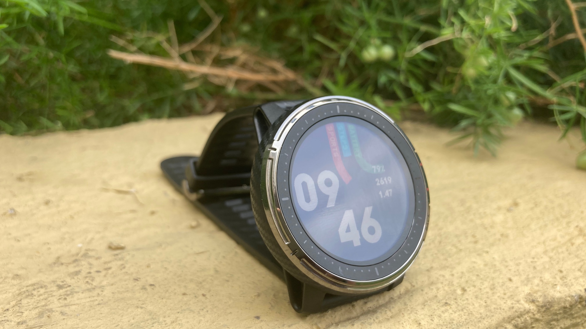The Amazfit Stratos 3 kept on a ledge in a folded state showing its display