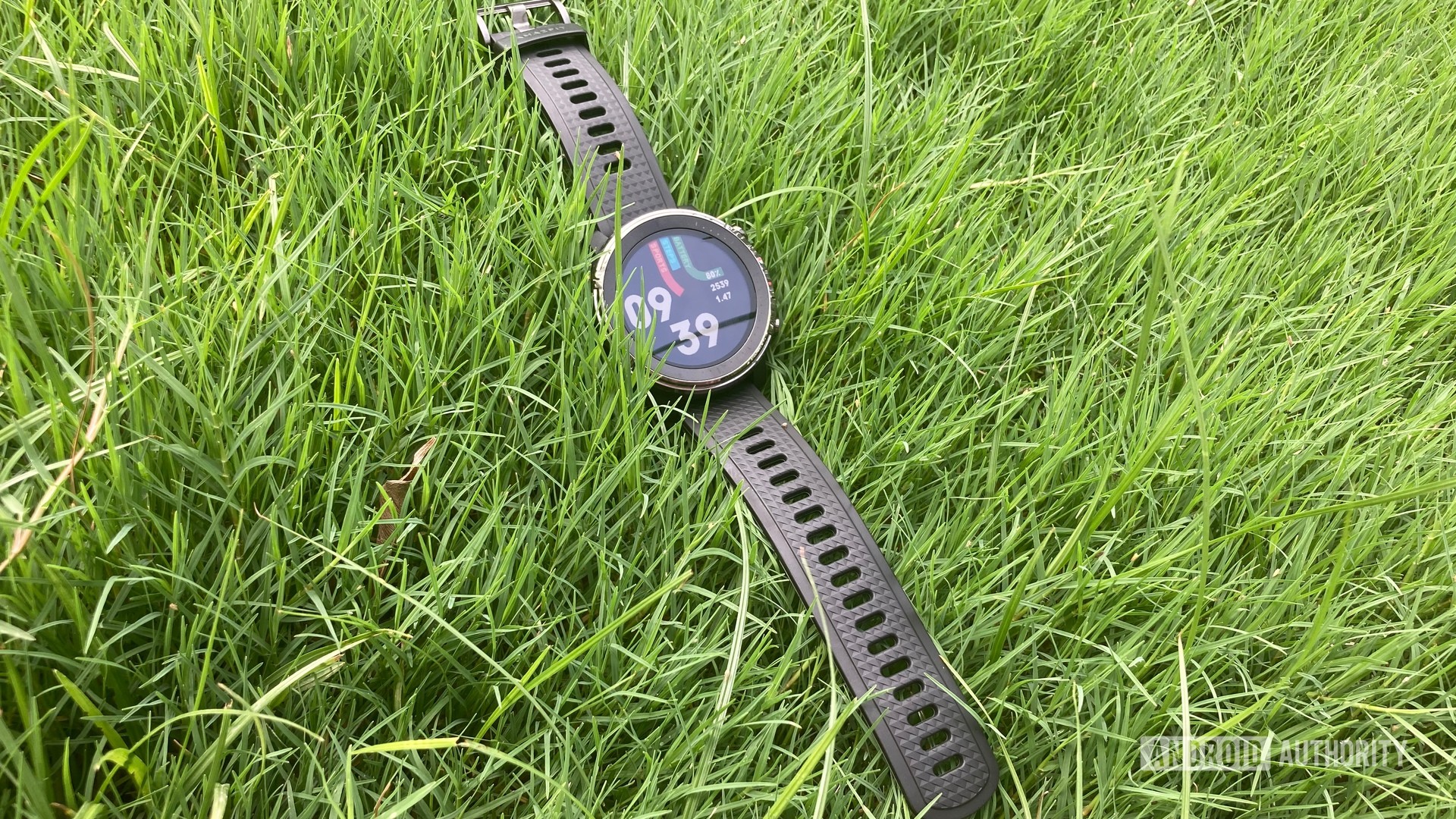 An image of the Amazfit Stratos 3 lying on grass