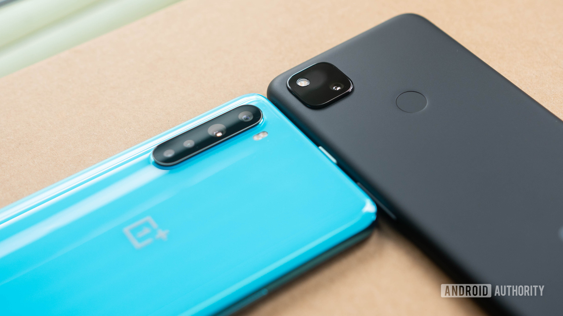 OnePlus Nord vs Pixel 4a Wide shot of the rear camera modules next to eachother