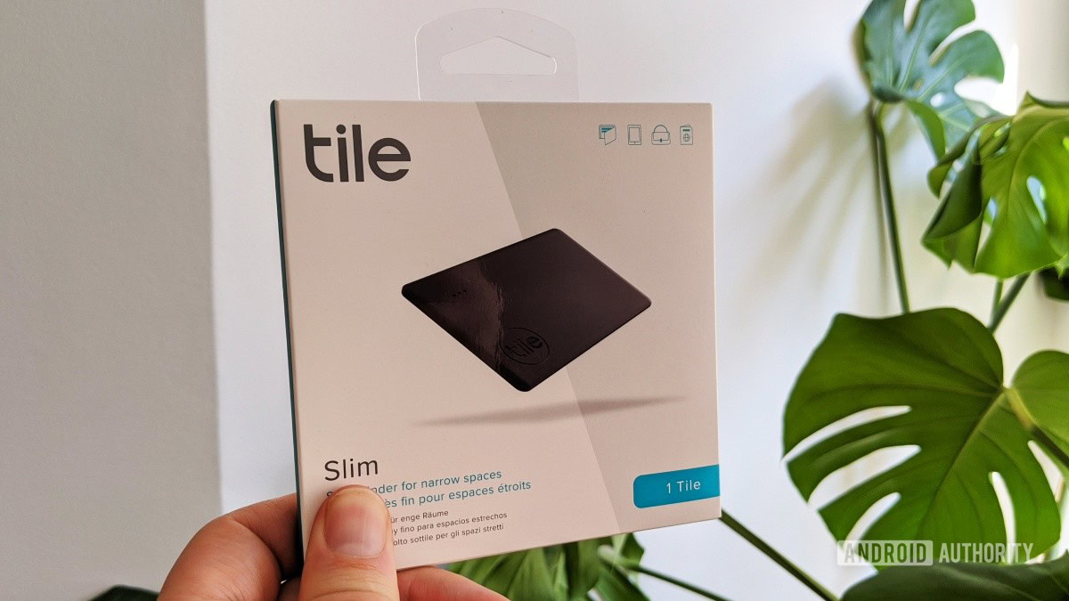 tile slim in hand