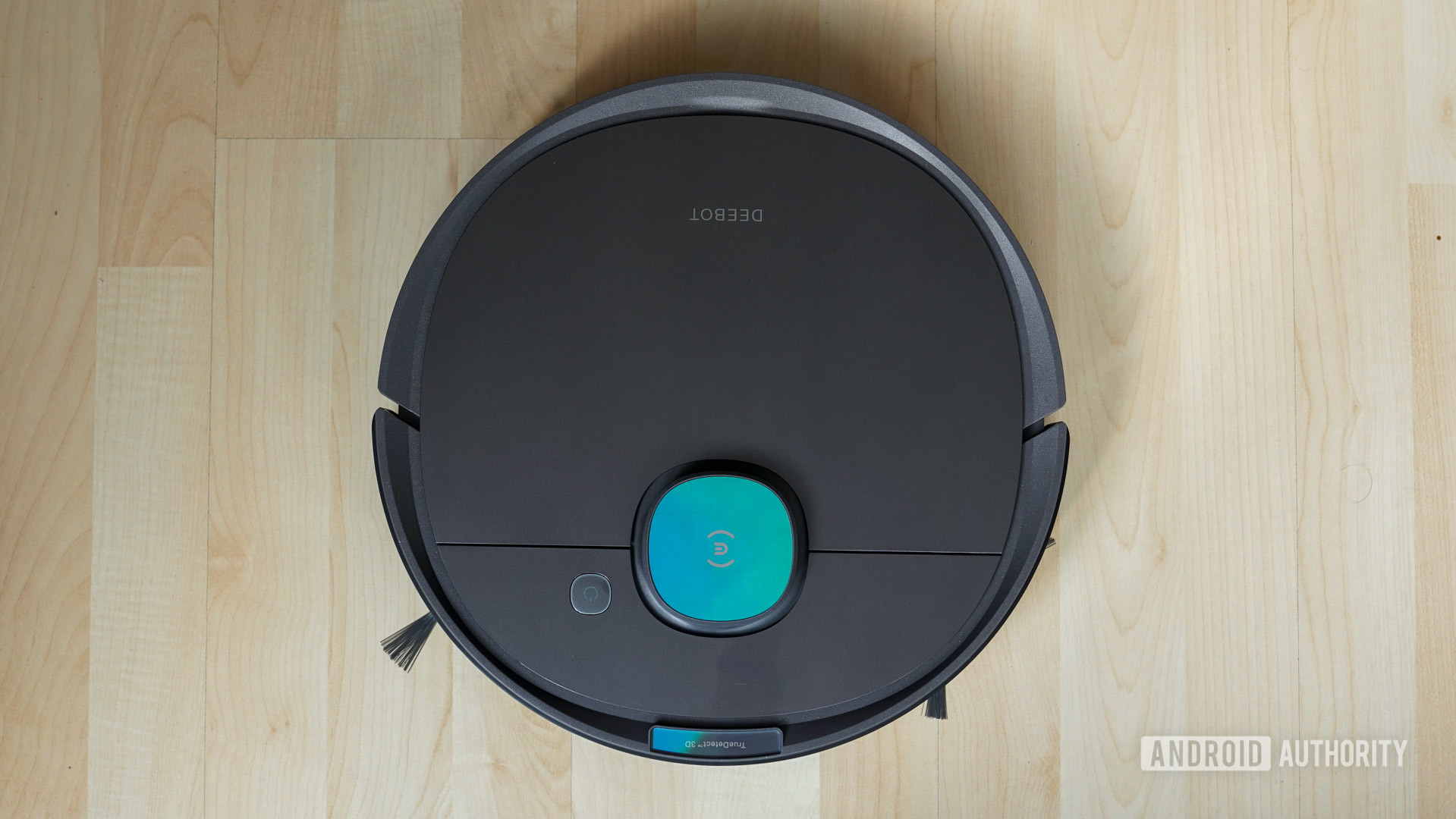 ECOVACS Deebot Ozmo T8 top down view of whole robot vacuum with brushes