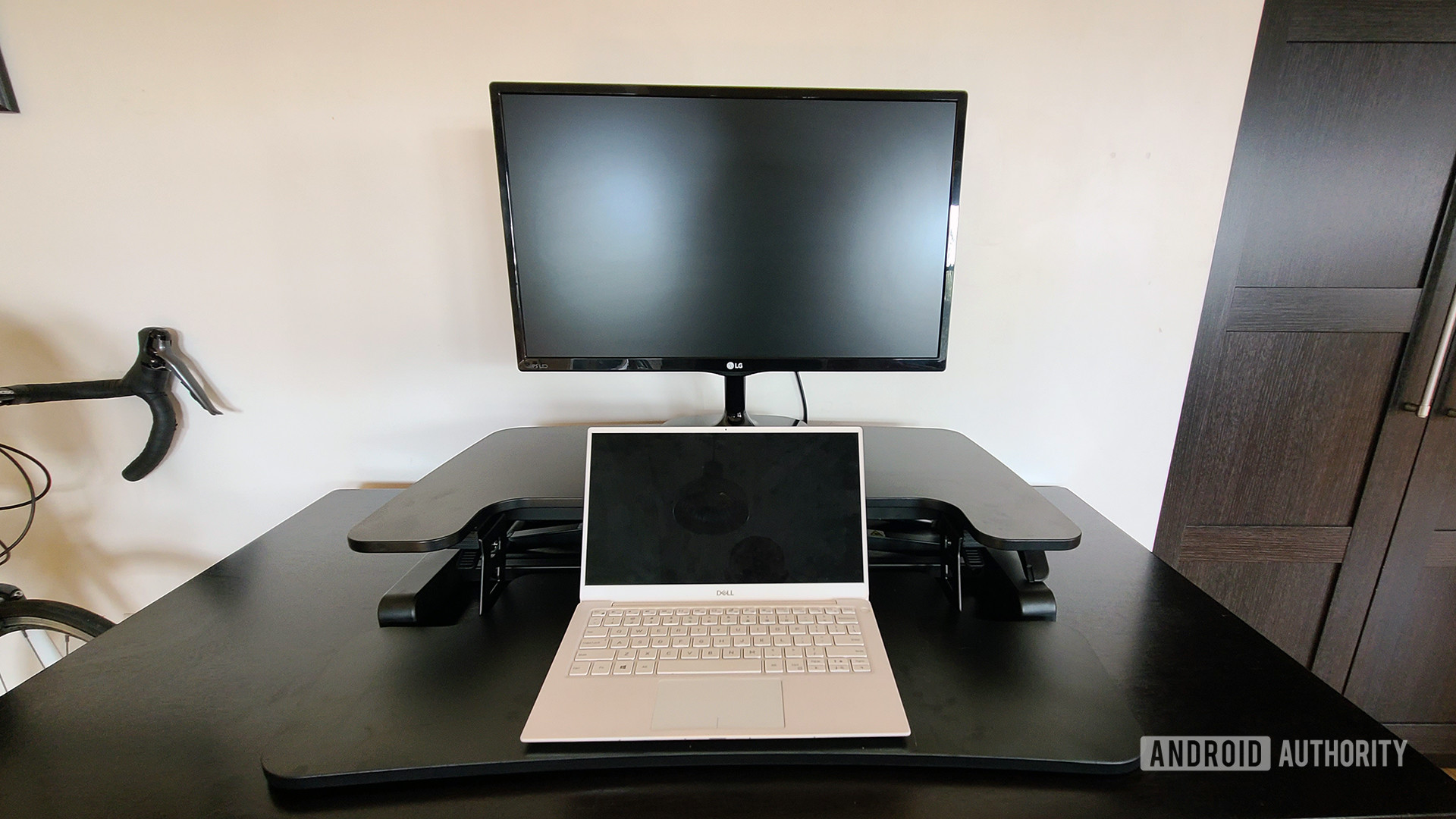FlexiSpot M7B Review Standing Desk Converter on Desk with Laptop Down Head On