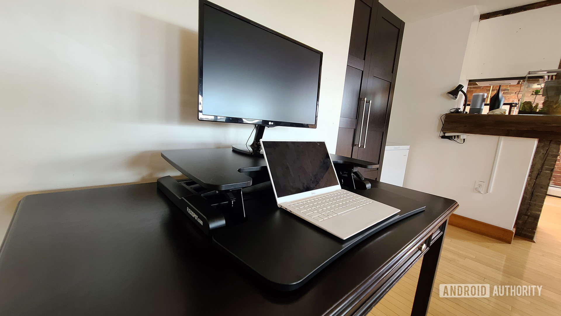 FlexiSpot M7B Review Standing Desk Converter on Desk with Laptop Down