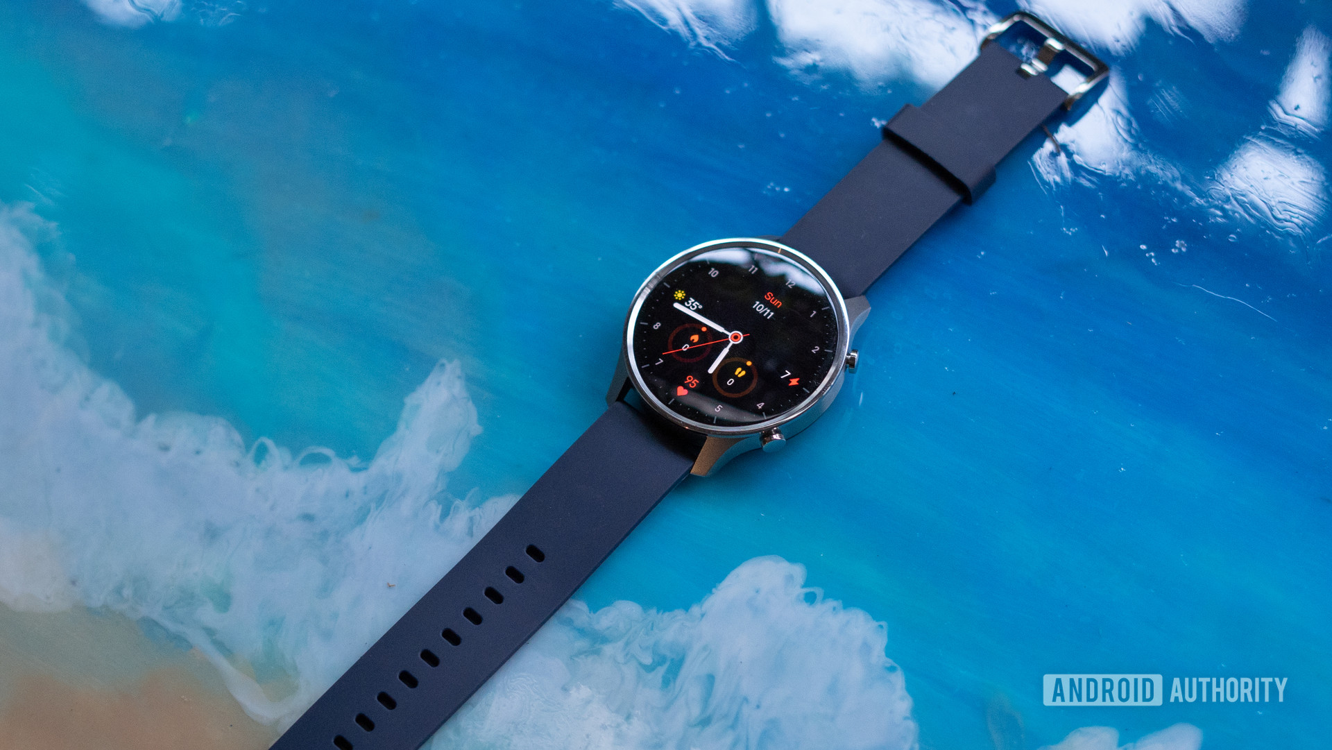 Mi Watch Revolve profile shot with display watchface and straps