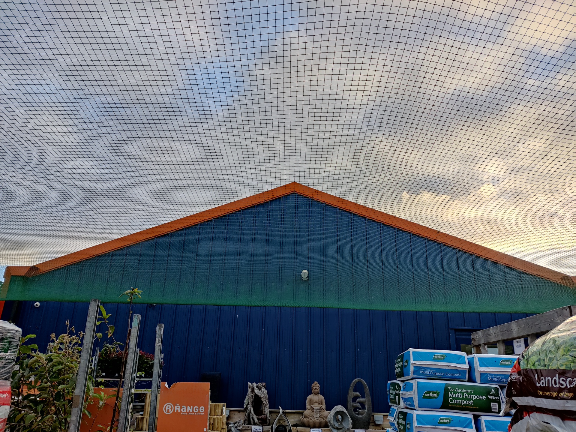 OnePlus 8T camera sample of netting above a garden center
