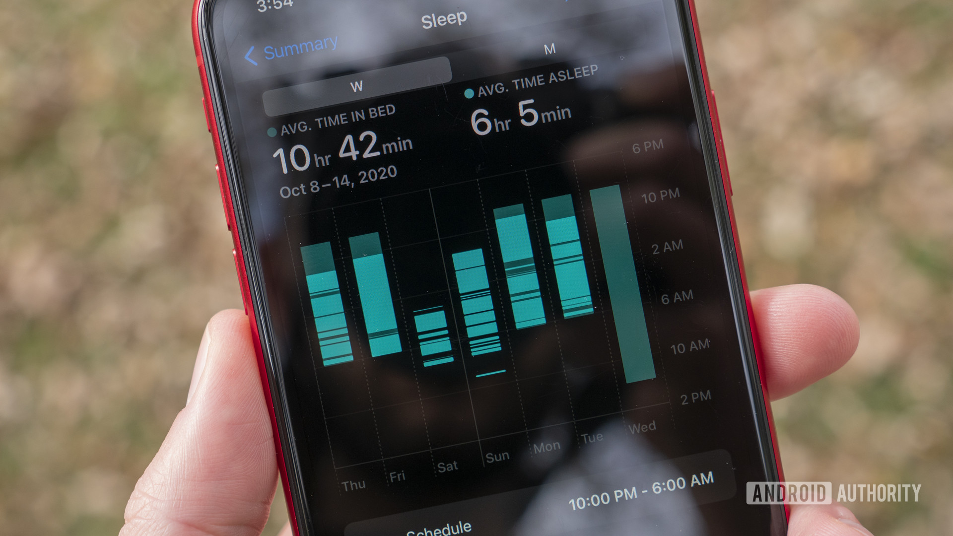 An iPhone paired with an Apple Watch Series 6 displays the user's sleep tracking data.