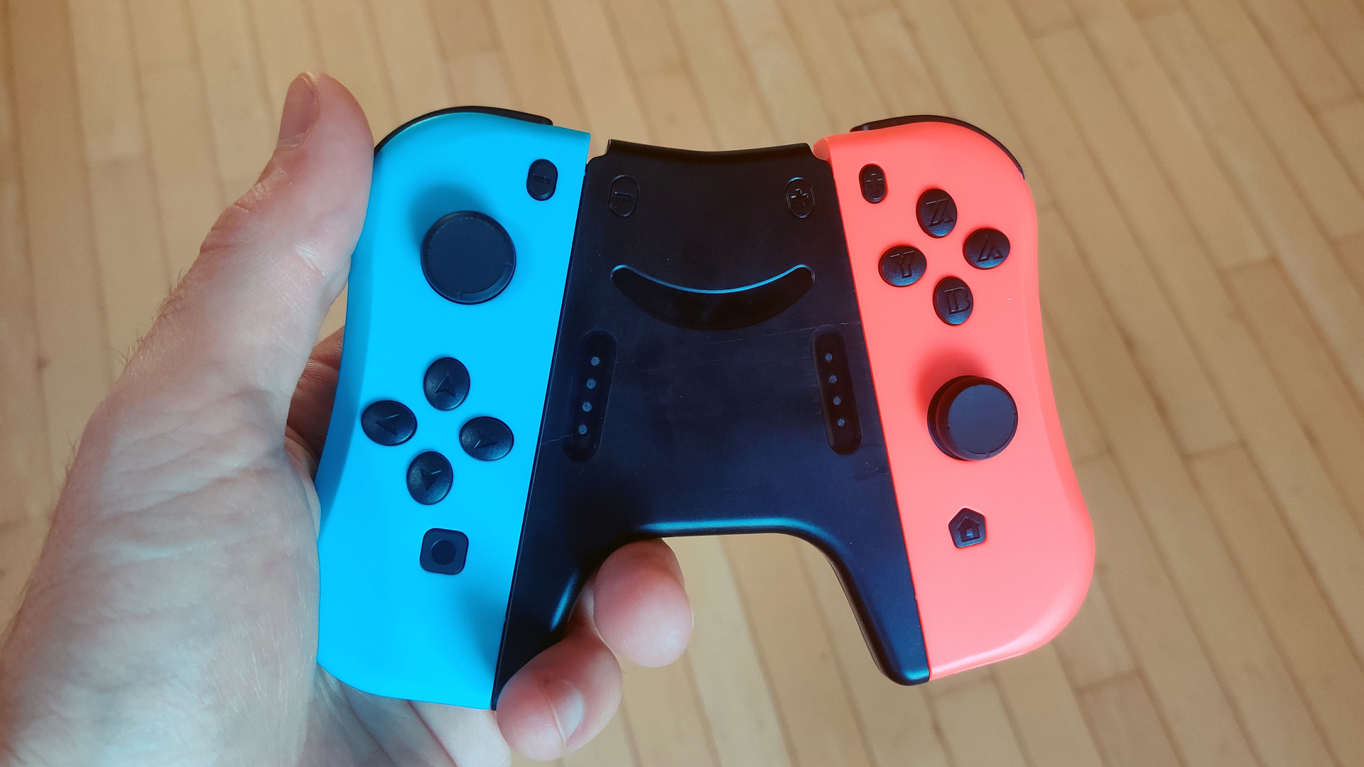 Kinvoca Joypad Controller for Nintendo Switch Review in Grip in Hand