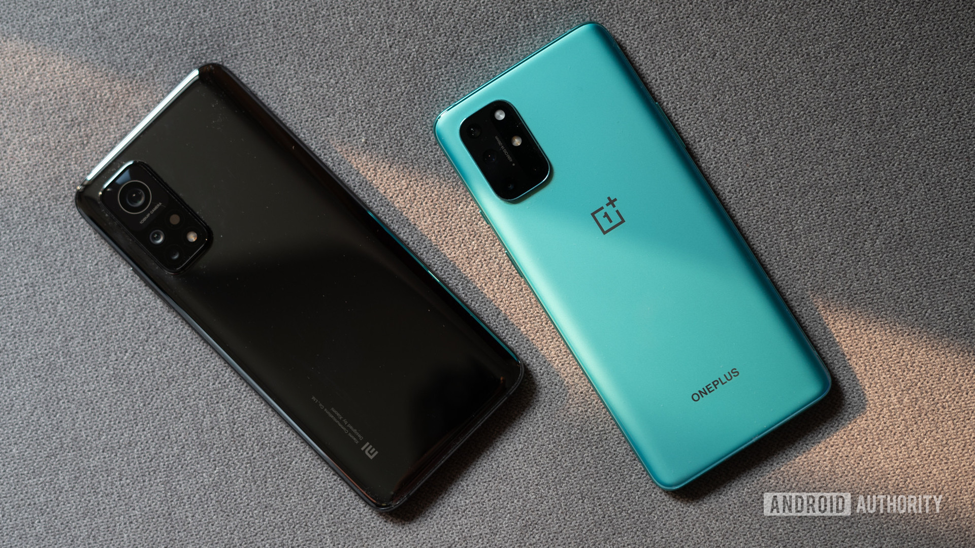 Mi 10T Pro vs OnePlus 8T showing the back of the phone