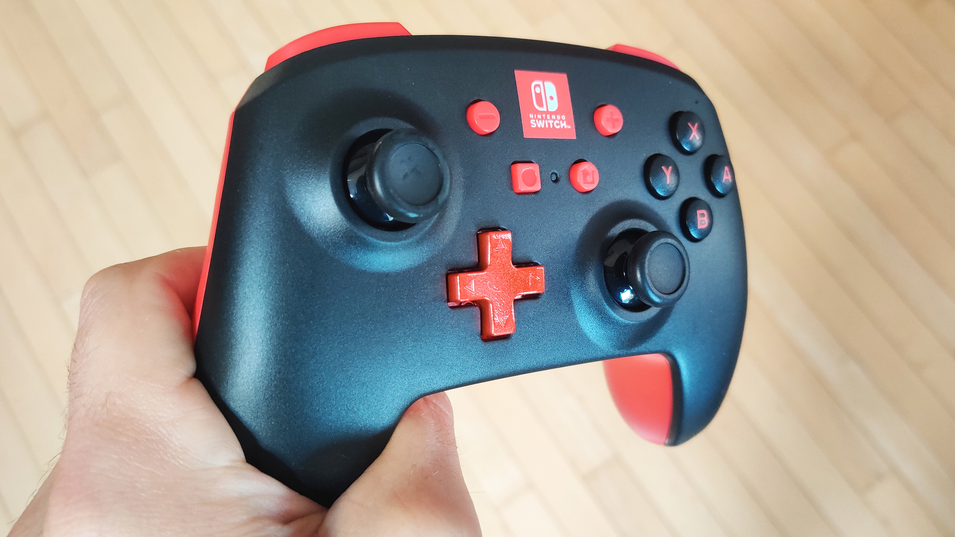 PowerA Enhanced Wireless Controller for Nintendo Switch in hand side view
