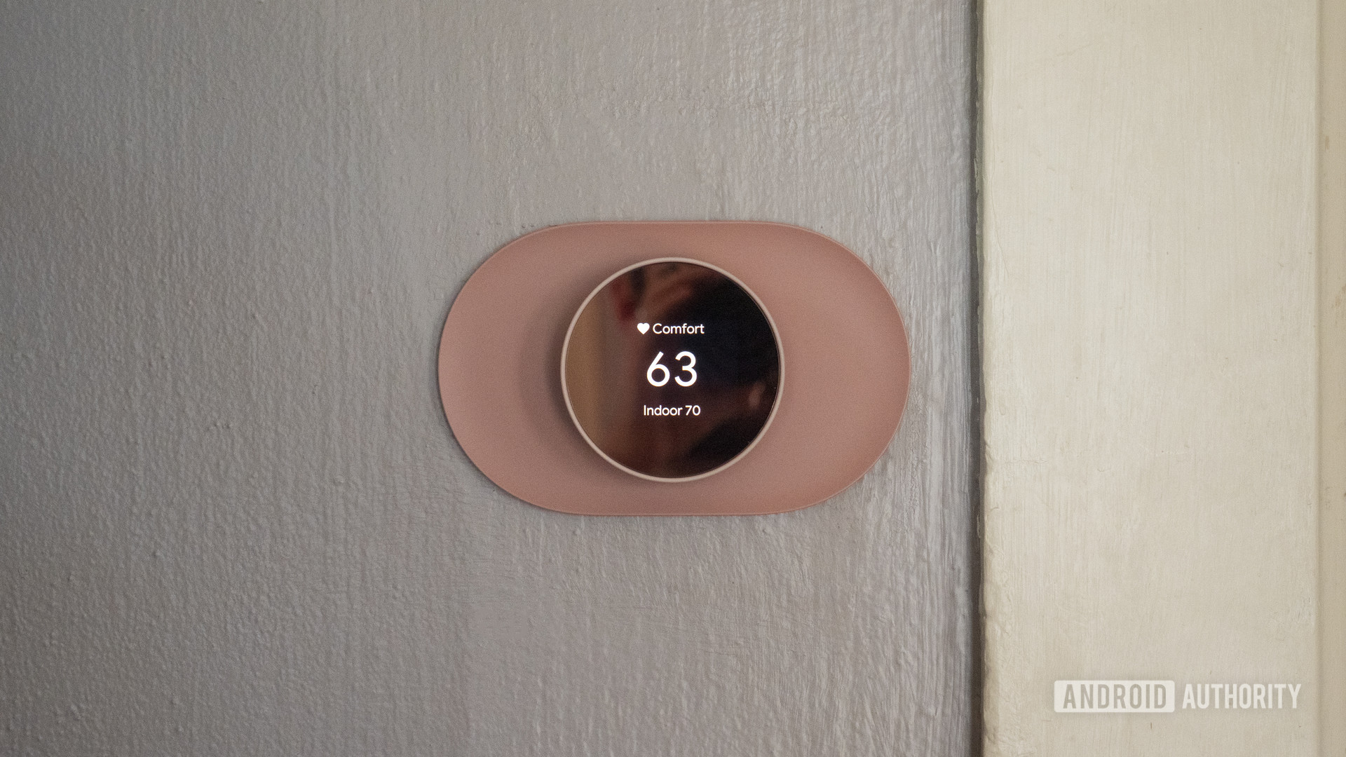 google nest thermostat review display temperature on wall 2