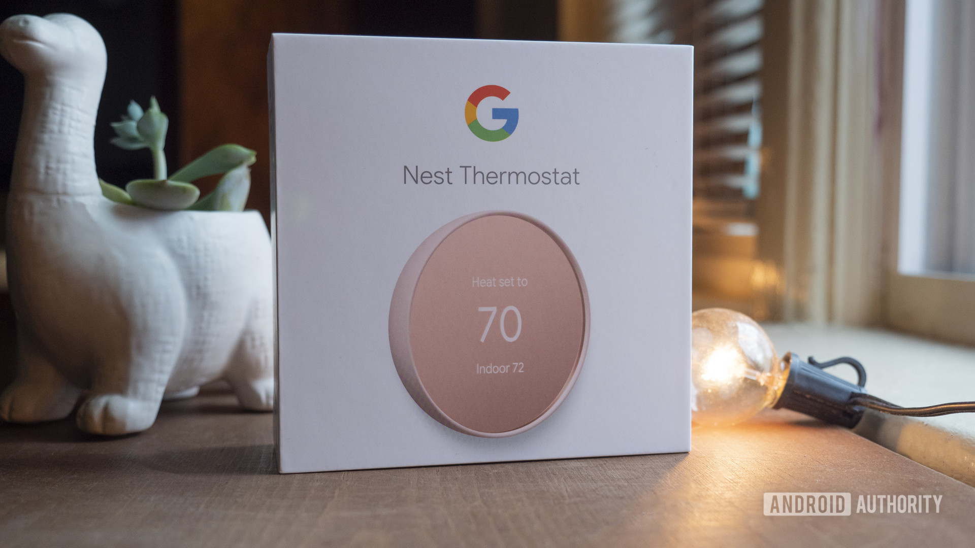 google nest thermostat review retail box sand