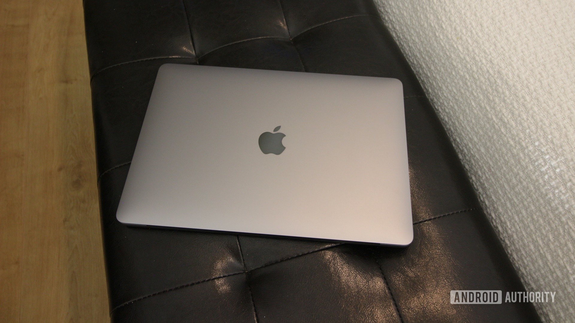 Apple MacBook Air M1 closed on black footrest