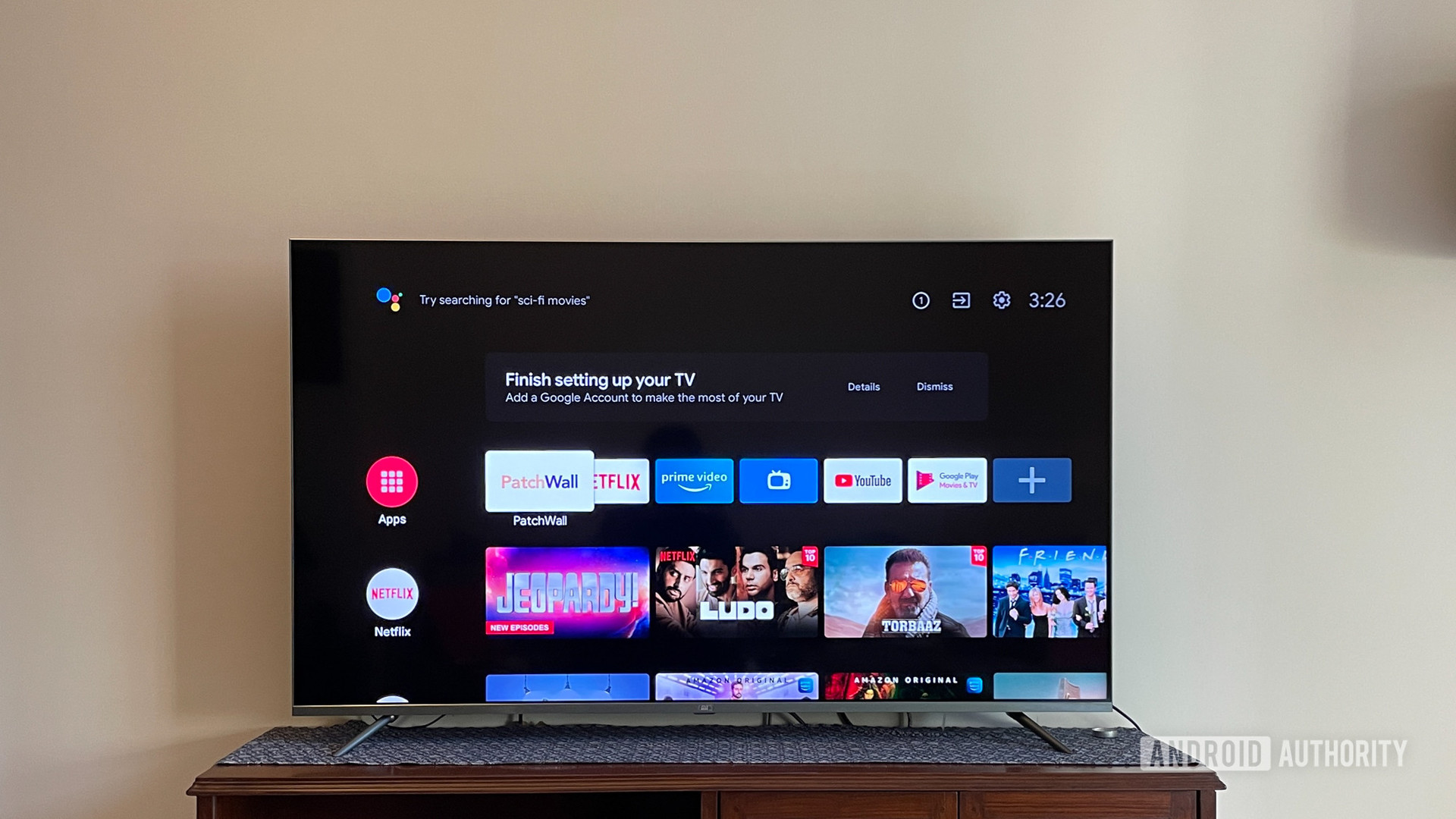 Mi QLED TV 4K with Android TV interface showing available apps