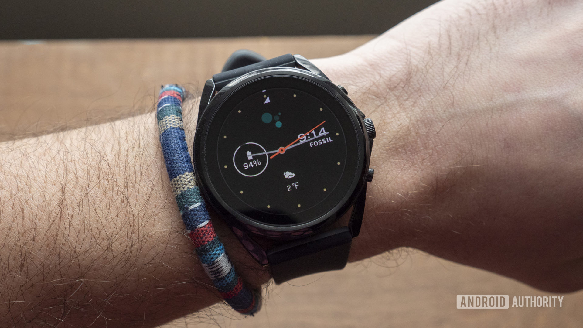 A Fossil Gen 5 LTE displays the time on a user's wrist.