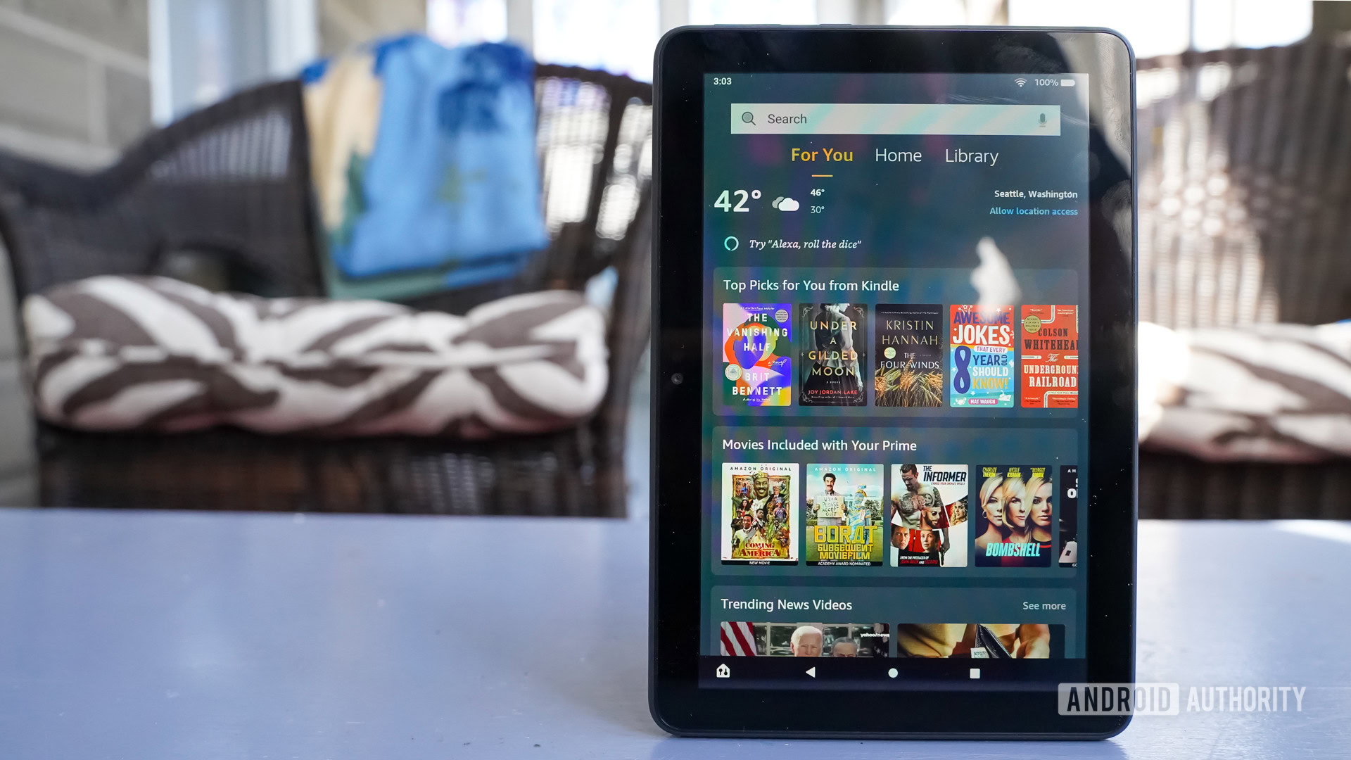 Amazon Fire 8 HD Plus with background best tablet deals