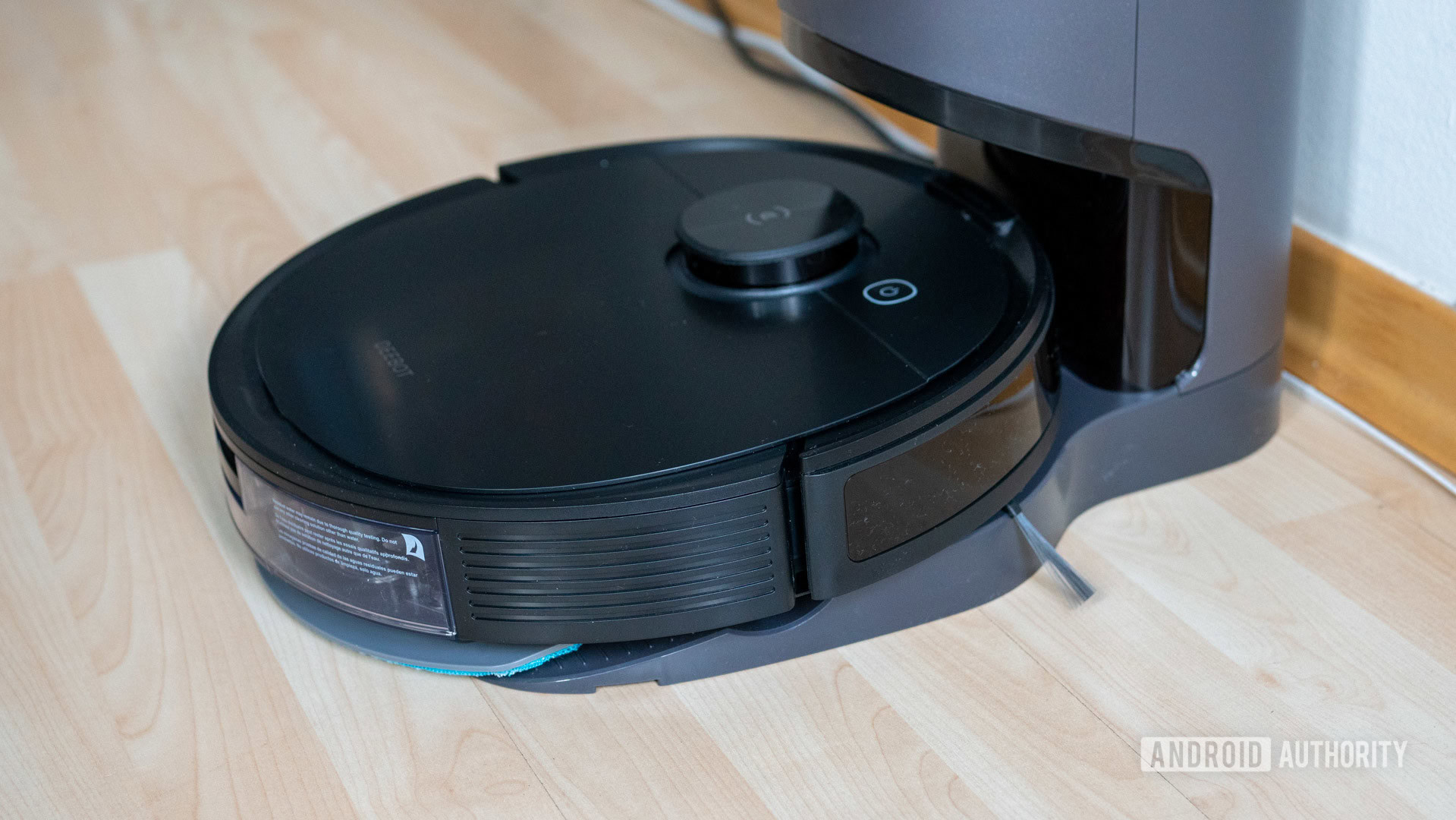 ECOVACS Deebot Ozmo N8 review robot vacuum on auto empty base station angle