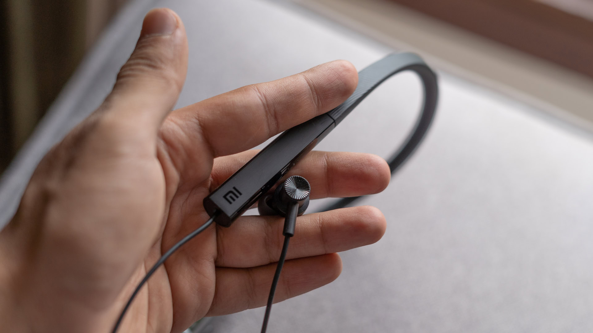 Mi Neckband Bluetooth Earphones review in hand